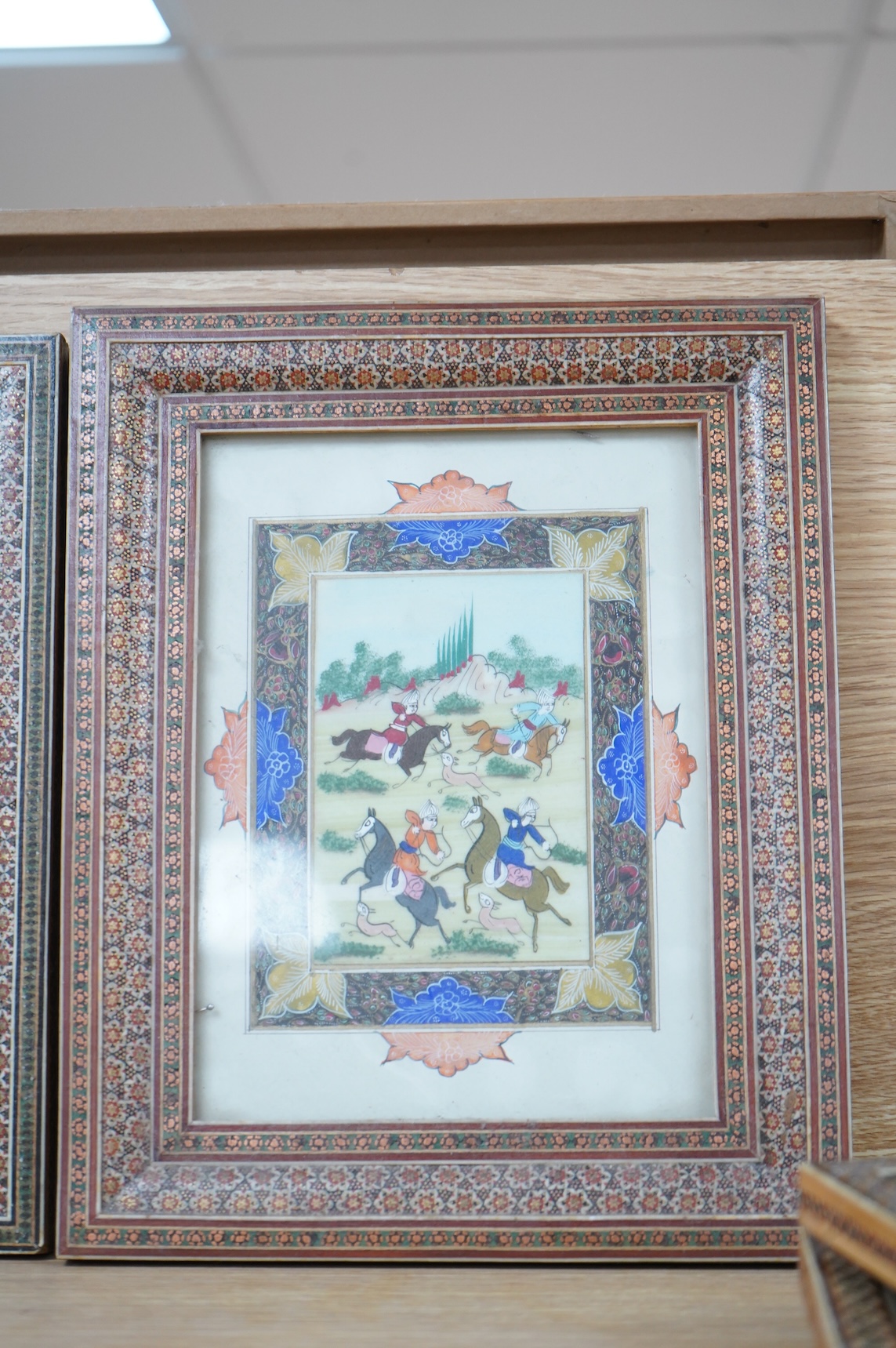 Four Indian school watercolours, Figures on horseback, housed in vizagapatam frames, largest 23 x 17cm